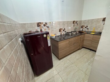 Kitchen in 1 BHK Apartment at Gaur City 2 - 14th Avenue, Sector 16c Greater Noida – for Rent