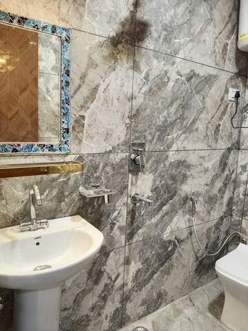 Bathroom in 3 BHK Apartment at Khirki Extension – for Rent