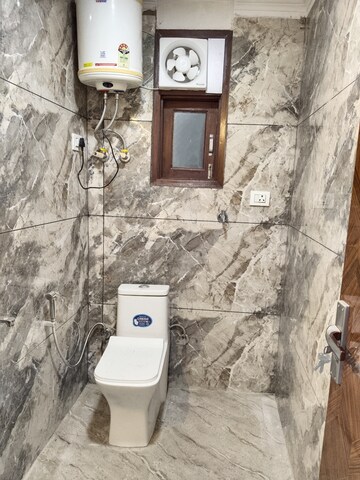 Bathroom in 3 BHK Apartment at Khirki Extension – for Rent