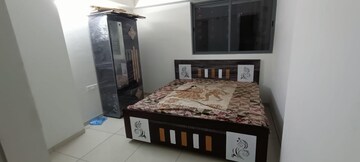 Master Bedroom in 1.5 BHK Apartment at Godrej Garden City, Jagatpur – for Rent