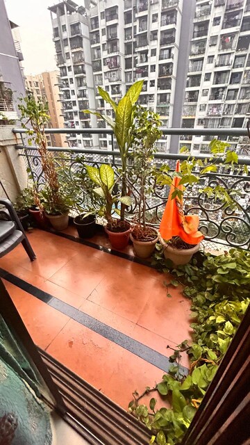Balcony in 2 BHK Apartment at Tharwani Rosewood Heights, Kharghar Sector 10 – for Rent