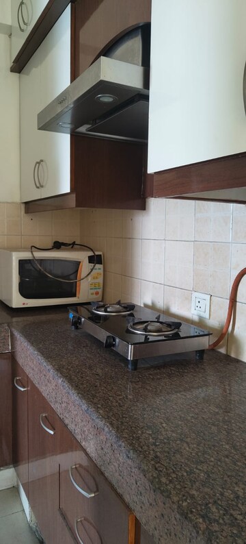 Living Room in 2.5 BHK Apartment at Nilaya Greens, Raj Nagar Extension – for Rent