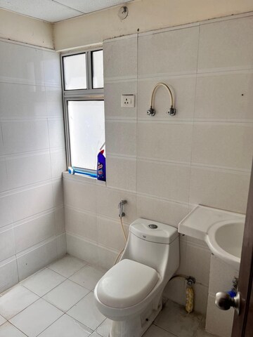 Bathroom in 2.5 BHK Apartment at Nilaya Greens, Raj Nagar Extension – for Rent