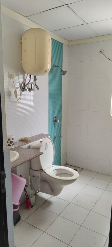 Bathroom in 2.5 BHK Apartment at Nilaya Greens, Raj Nagar Extension – for Rent