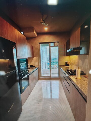 Kitchen in 2.5 BHK Apartment at Madhav Palacia, Ghodbunder Road – for Sale