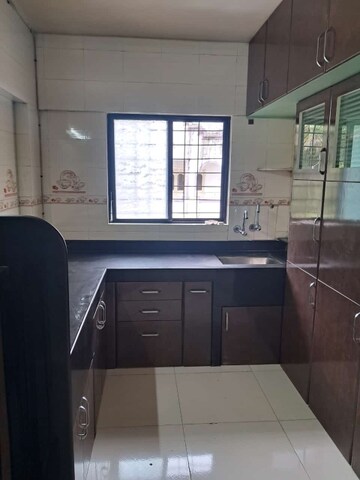 Kitchen in 2 BHK Apartment at Shree Ostwal Orchid, Mira Road – for Rent
