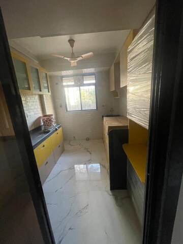 Kitchen in 2 BHK Apartment at Raj Paradise B Wing CHS Ltd, Andheri East – for Rent