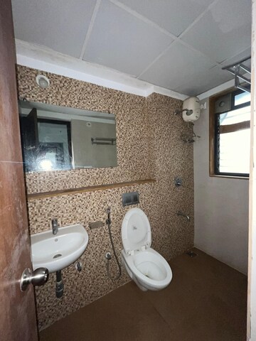 Bathroom in 2 BHK Apartment at Lodha Palava Downtown, Dombivli East – for Rent