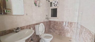 Bathroom in 3 BHK Apartment at Gardenia Golf City, Sector 75 – for Sale
