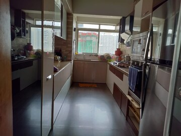 Kitchen in 4 BHK Apartment at Runwal Greens, Mulund West – for Sale