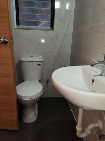 Bathroom in 2 BHK Apartment at Kumar Palaash A, Wadgaon Sheri – for Rent