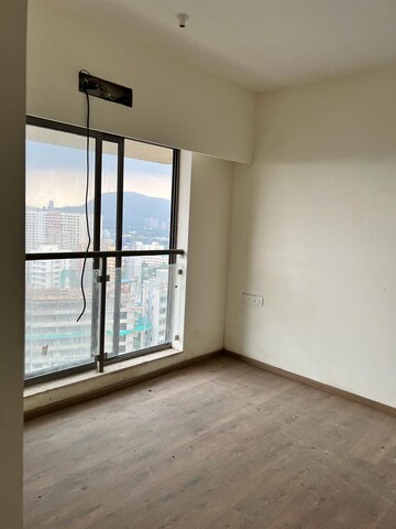 Room in 2 BHK Apartment at Kalpataru Aura, Ghatkopar West – for Rent