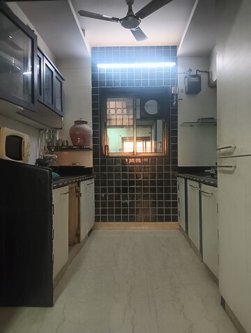 Kitchen in 3 BHK Apartment at Regency Estate, Dombivli East – for Sale