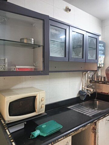 Kitchen in 3 BHK Apartment at Regency Estate, Dombivli East – for Sale