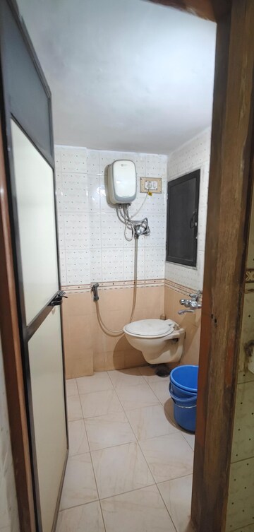 Bathroom in 2 BHK Apartment at Ambo Vihar CHS, Virar West – for Rent