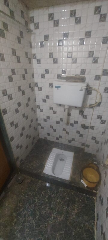 Bathroom in 1 BHK Apartment at Sawan Plaza CHS, Kopar Khairane – for Sale