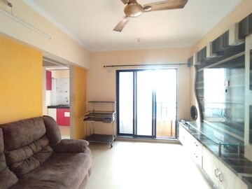 Living Room in 1 BHK Apartment at Raunak City 3, Kalyan West – for Sale
