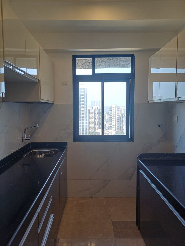 Kitchen, dev-leo-tower 2 Bedroom 670 Sq.Ft. Apartment In Oshiwara Mumbai 7989505