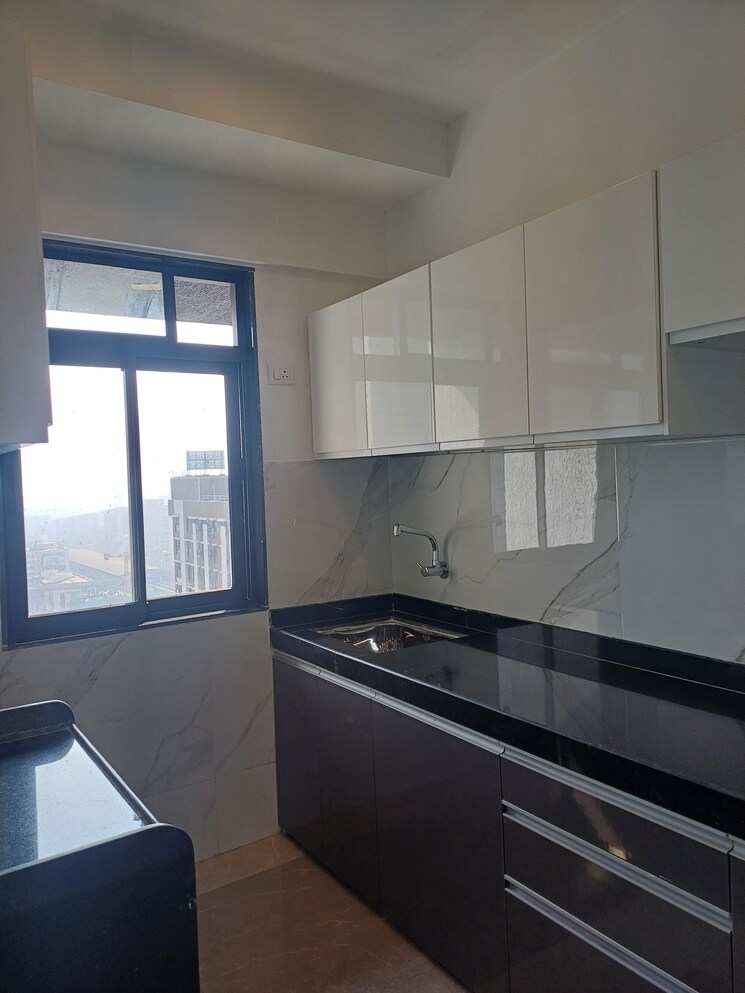 Kitchen, dev-leo-tower 2 Bedroom 670 Sq.Ft. Apartment In Oshiwara Mumbai 7989505
