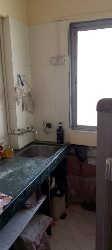 Kitchen in 1.5 BHK Apartment at Galaxy Exotica, Vile Parle East – for Rent