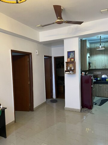 Living Room in 2.5 BHK Apartment at Nimbus The Golden Palm, Sector 168 – for Rent