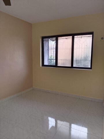 Room in 2 BHK Apartment at Mohan Pride, Kalyan West – for Sale