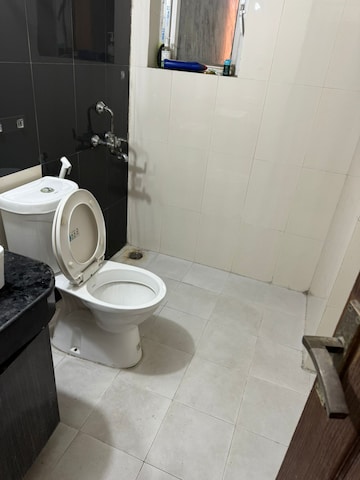 Bathroom in 2 BHK Apartment at Antriksh Golf View, Sector 78 – for Rent