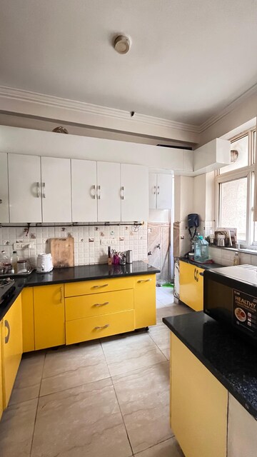 Kitchen in 2 BHK Apartment at Antriksh Golf View, Sector 78 – for Rent