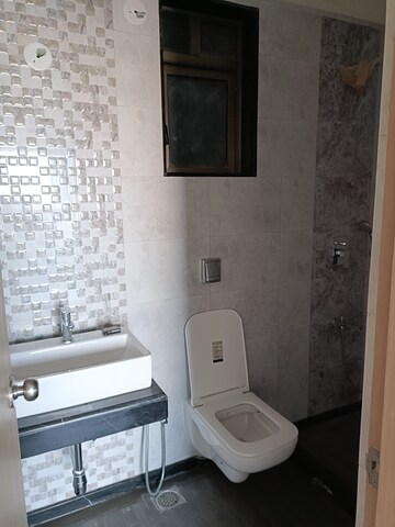 Bathroom in 2 BHK Apartment at Rajesh Raj Infinia, Malad West – for Rent