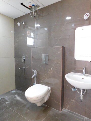Bathroom in 3 BHK Apartment at Ambience Courtyard, Manikonda – for Rent