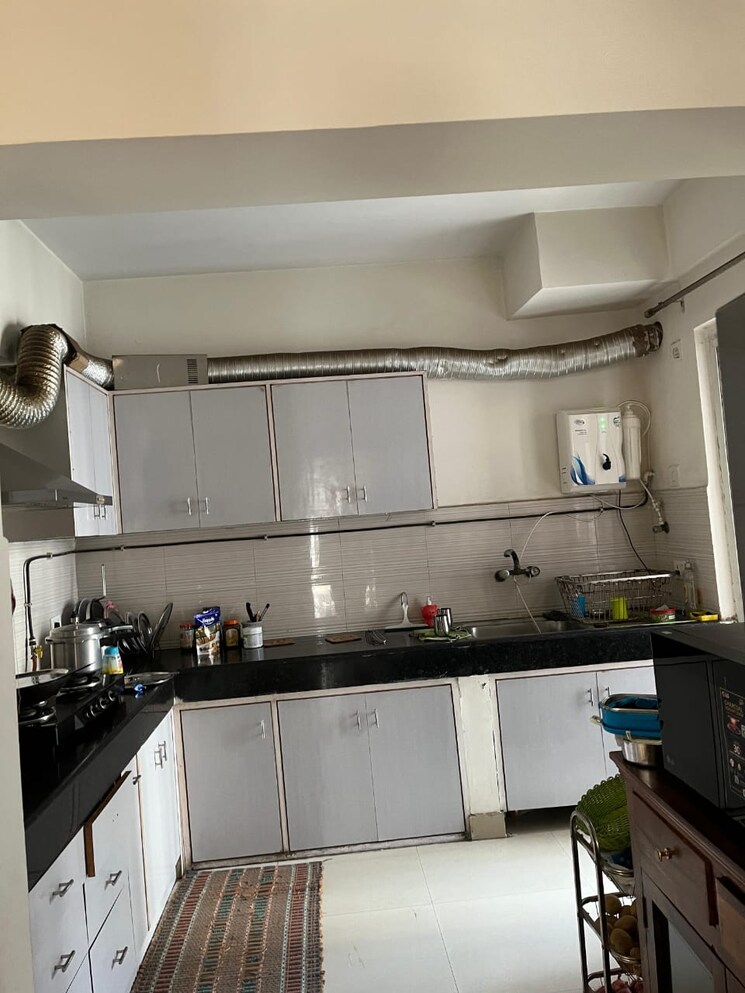 Kitchen, griha-pravesh 3 Bedroom 1745 Sq.Ft. Apartment In Sector 77 Noida 7991397