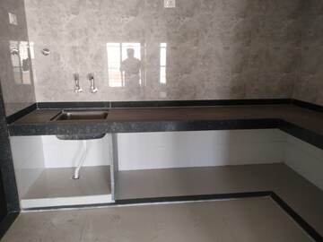 Kitchen in 2.5 BHK Apartment at Gini Belvista Phase 1, Dhanori – for Sale