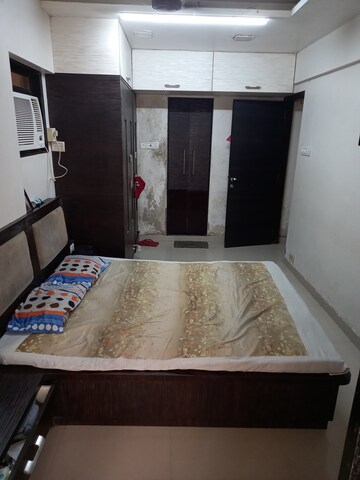 Bedroom in 2 BHK Apartment at Madhurima CHS, Andheri West – for Rent