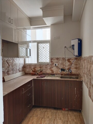 Kitchen in 3 BHK Apartment at Amrapali Riverview, Amrapali Leisure Valley – for Rent