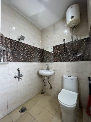 Bathroom in 1 RK Builder Floor at Ansal Sushant Lok I, Sector 43 – for Rent