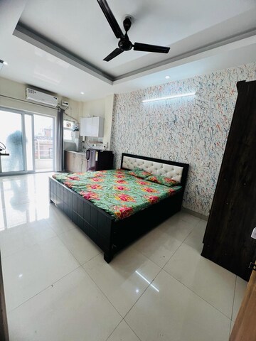 Master Bedroom in 1 RK Builder Floor at Ansal Sushant Lok I, Sector 43 – for Rent