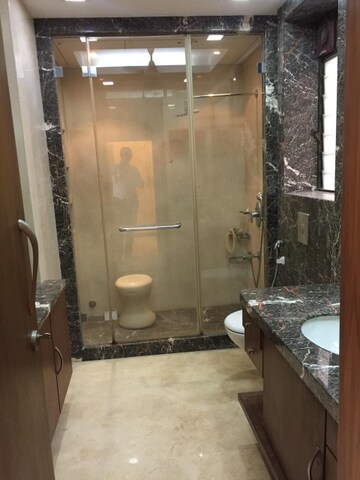 Bathroom in 5 BHK Apartment at Vasant Vihar – for Sale