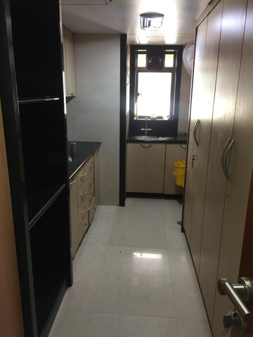Kitchen in 5 BHK Apartment at Vasant Vihar – for Sale