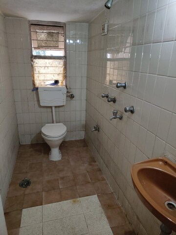 Bathroom in 2 BHK Apartment at Lokpuram CHS, Vasant Vihar – for Rent