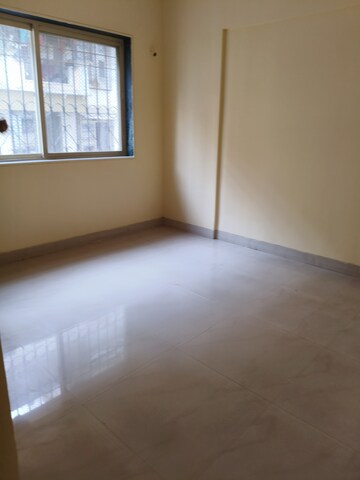 Master Bedroom in 2 BHK Apartment at Shree Gajanan Maharaj Nagar CHS, Kalyan West – for Rent