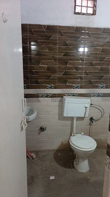 Bathroom in 2 BHK Apartment at Vasundhara Enclave – for Sale