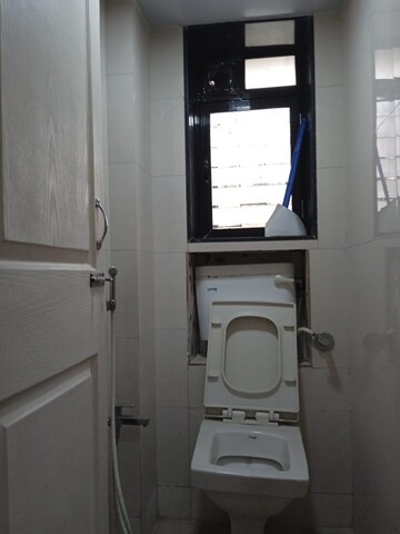 Bathroom in 2 BHK Apartment at Rajkumar Corner CHS, Andheri West – for Rent