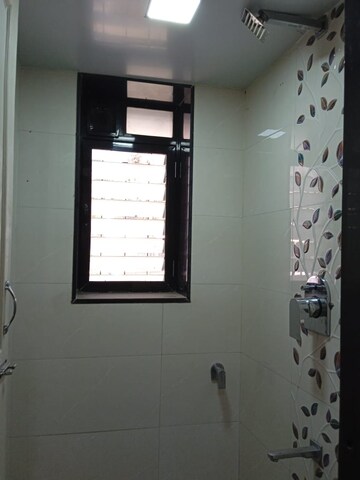 Room in 2 BHK Apartment at Rajkumar Corner CHS, Andheri West – for Rent