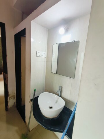 Bathroom in 2.5 BHK Apartment at Shree Satya Shankar Residency, Manpada – for Rent