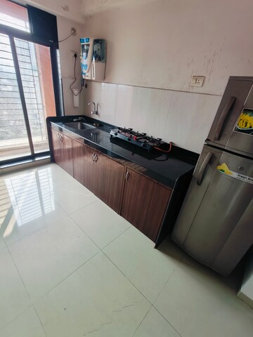 Kitchen in 2.5 BHK Apartment at Shree Satya Shankar Residency, Manpada – for Rent