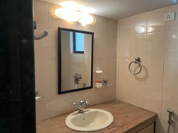 Bathroom in 1.5 BHK Apartment at Hiranandani Estate – for Rent