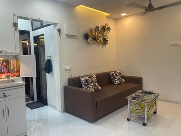 Living Room in 2 BHK Apartment at Siddha Seabrook, Kandivali West – for Rent
