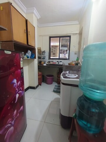 Kitchen in 1 BHK Apartment at Royal Palms, Goregaon East – for Rent