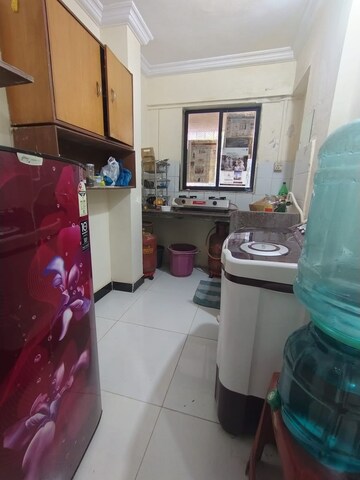 Kitchen in 1 BHK Apartment at Royal Palms, Goregaon East – for Rent