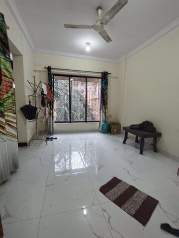 Living Room in 1 BHK Apartment at Royal Palms, Goregaon East – for Rent